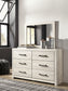 Cambeck Queen Panel Bed with 4 Storage Drawers with Mirrored Dresser